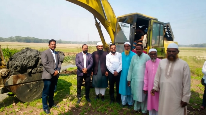 আমতলীতে জীনবুনিয়া খাল খনন কাজে এক্সক্যাভেটর এবং উপস্থিত কর্মকর্তারা